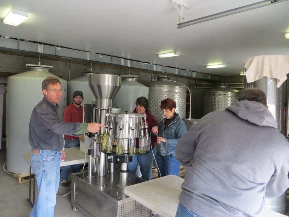 John, the winemaker, having fun with the bottling crew.