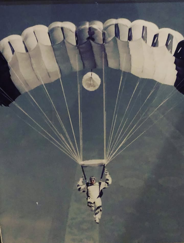 Join us this Saturday, 4/15/23, as we honor one of our former owners at the Brad Foster Memorial Fly-in. Weather permitting, hang gliders will fly from the Woodstock Fire Tower and land in the fields of our vineyards during the afternoon. We invite the public to come by and chat with some of these pilots while enjoying a bottle of wine. Brad Foster was the owner/manager of the vineyard but also wore many hats. Not only was he a pilot for the army, he also served on the Army parachute team and was stationed in Germany for many years, as well as the loving husband and best friend of our owner, Ms. Krista. This picture of Brad was taken during a jump in Pasa Robles, CA.