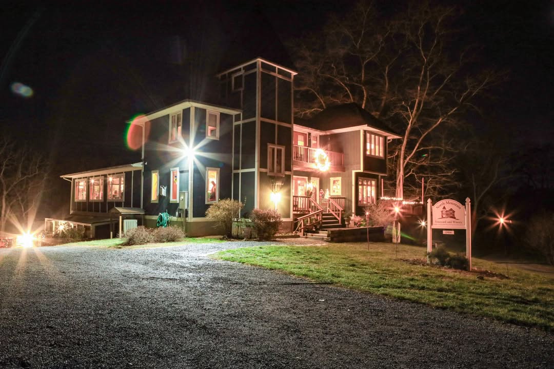 As the sun dipped below the peaks of the Appalachian Mountains, the vineyard was bathed in a soft golden glow. Twinkling lights adorn the winery, casting a warm and inviting ambiance over the winter solstice festivities. Mulled wine flows freely as friends gather around crackling bonfire, their laughter mingling with the crisp evening air. Torches dance in the moonlight as the vineyard celebrates the longest night of the year, a time-honored tradition that brings together friends and family to share in the magic of the season. Amidst the vineyard's sprawling grapevines, a sense of timeless wonder and camaraderie fills the air, making the winter solstice a truly enchanting and memorable occasion.