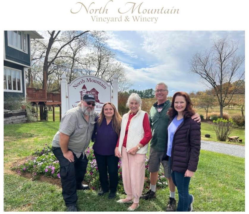 Hello All, The fall has brought the changing of the leaves as well as changes of ownership at North Mountain Vineyard and Winery. We are excited to announce North Mountain Vineyard & Winery has transitioned from the Foster-Jackson Family to the Edlich Family this past weekend. The Foster-Jackson Family were the caretakers of the beloved vineyard and winery for over twenty-seven years. However, it is time for us to retire and transfer the property to a new family, just as it was passed to us from the McCormick Family, who established the vineyard in 1982. We hope you understand that the sale process from the Foster-Jacksons to the Edlichs was swift and low key to ensure all went smoothly. We wish you to know that the most important things we'll take away are the friendships we've cultivated with all of you. Thank you for your continued support and the countless shared moments over a glass of wine. We hope your times spent with Brad, Krista, Kelly, John, along with pups and kitties, were as special to you as they were for us. We cherish the memories and wish you all the very best. We will remain in the Shenandoah Valley and hope to see you at community events. Wonderful changes have already begun at the vineyard under Jill, husband Bob, and children. With much gratitude, Krista, John, and Kelly Jill, Bob, and Family