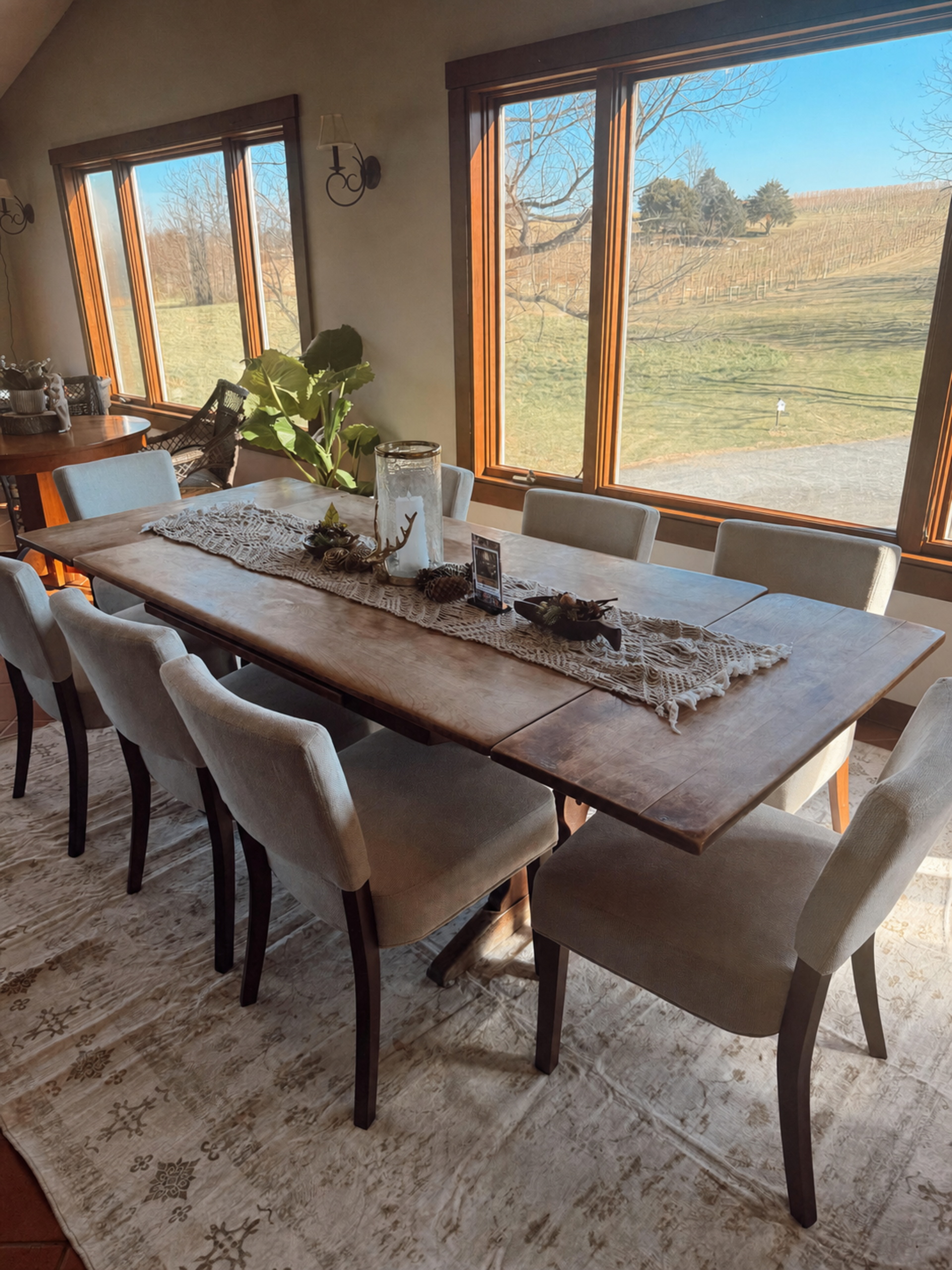 Tasting room dining table with vineyard views at North Mountain