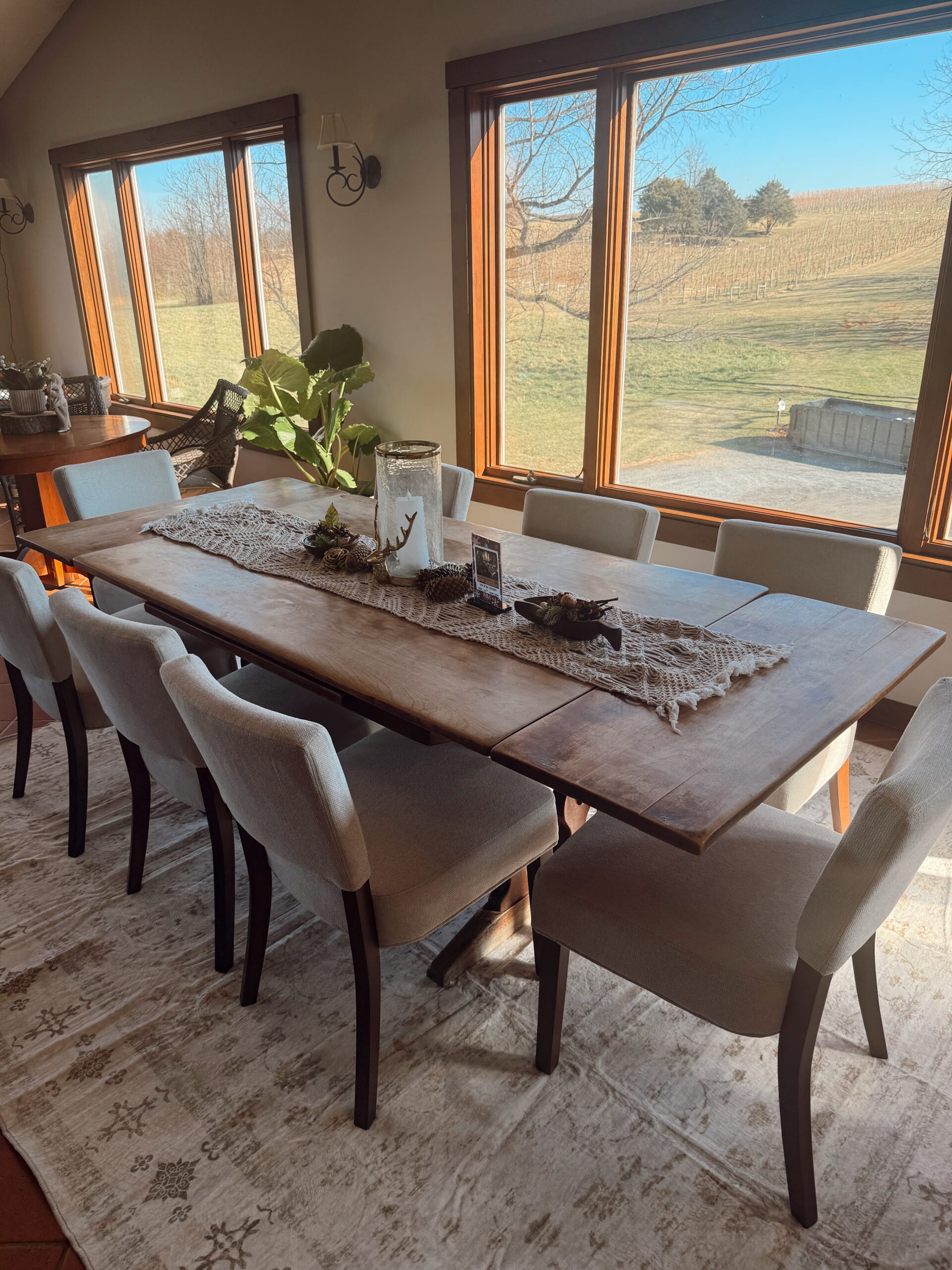 Tasting room dining table with vineyard views at North Mountain
