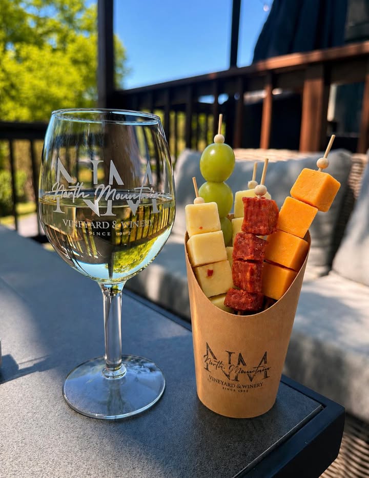 🍷 Wine Down Wednesday is here! 🍷 Take a break, relax, and enjoy 50% OFF glasses of wine today from 11AM-5PM at North Mountain Vineyard & Winery. Whether you’re catching up with friends, enjoying a quiet afternoon, or just need a midweek reset, we’ve got the perfect pour waiting for you. 📍 North Mountain Vineyard & Winery ⏰ 11AM-5PM Excludes cider, wine cocktails, sangria, and flights. Because Wednesdays are better with wine. 🍇 #WineDownWednesday #WineSpecials #Winery #Vineyard #VirginiaWine #LoveVa